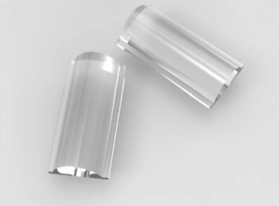 Elongated fused silica TIR lens forms